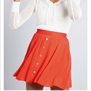ModCloth orange button up skirt.